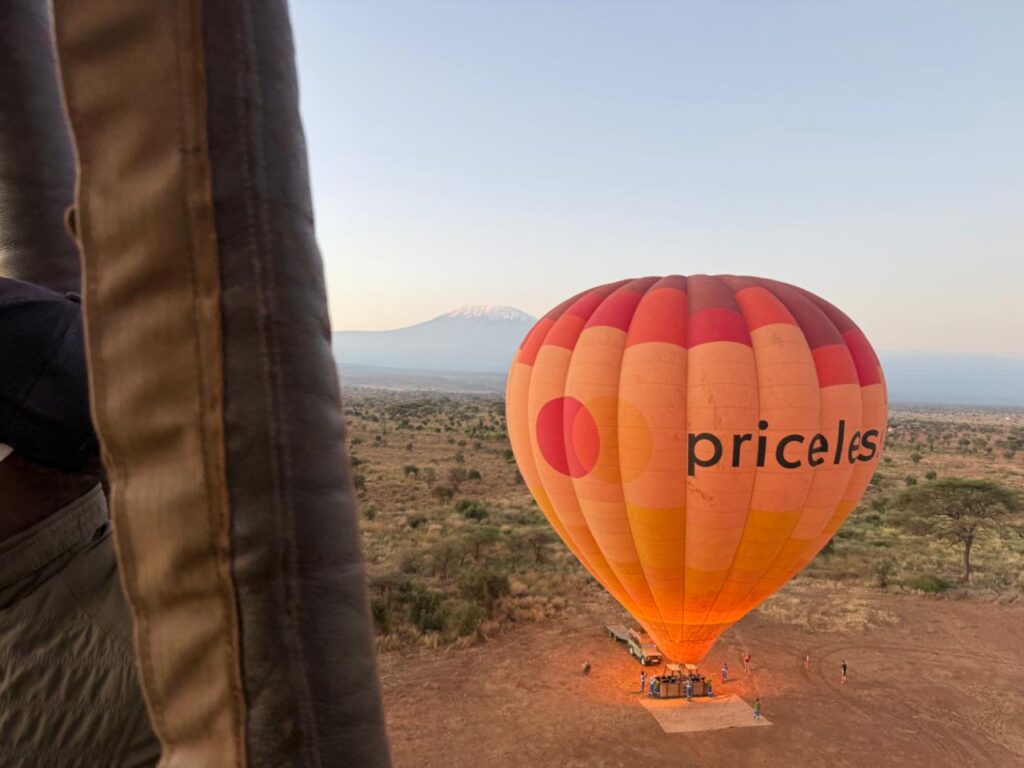 An airborne hot-air balloon in Amboseli, Kenya